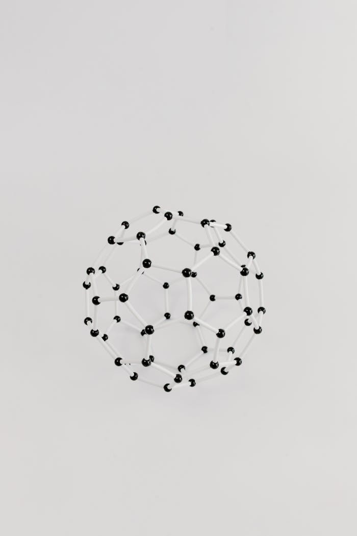 Abstract representation of a molecular structure in a geometric model on a plain white background.